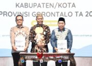 Penyerahan LHP LKPD Pemerintah Kabupaten/Kota tahun 2024, Dari BPK - RI Perwakilan Provinsi Gorontalo. (Fhoto : Kominfo)