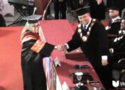Dr. Espin Tulie resmi menyandang gelar doktor usai menuntaskan studi program doktor di universita negeri gorontalo, Rabu, 25/06 (fhoto:dok.ulands)