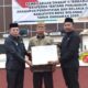 Bupati Ismet Mile bersama Wakil Bupati Risman Tolingguhu dan Ketua DPRD Faisal Yunus saat Rapat Paripurna DPRD Bone Bolango dalam rangka Pembicaraan Tingkat II Terhadap Ranperda Tentang Perubahan APBD Tahun Anggaran 2025 di Ruang Sidang Paripurna DPRD, Jumat (25/7/2025). (F.AKP/Humas Diskominfo)