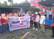 Wakil Bupati Risman Tolinggohu didampingi Sekda Iwan Mustapa saat mengikuti jalan sehat sekaligus menghadiri dan memberikan apresiasi tinggi terhadap kegiatan Semarak Peringatan HUT ke-80 Republik Indonesia yang diselenggarakan oleh Kerukunan Keluarga Kono Serumpun dan Ikatan Kerukunan Keluarga Maksum Serumpun, Sabtu (9/8/2025). (F.Boby/ADC)/Ulanda.id