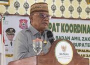 Bupati Ismet Mile saat memberikan sambutan pada Rapat Koordinasi Daerah (Rakorda) Badan Amil Zakat Nasional (Baznas) Kabupaten Bone Bolango dalam rangka Optimalisasi Pengumpulan dan Pengelolaan Zakat, Infaq dan Sedekah yang digelar di Gedung KPRI Kartini, Kecamatan Kabila, Rabu (30/7/2025) (F.AKP/Diskominfo)/Ulanda.id