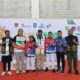 Sekertaris KORMI Provinsi Gorontalo, Ir. M. Rijal Syukri dan official kontingen foto bersama atlet pelatih Inorga YPOK Gorontalo