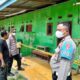 Garis polisi membentang di area kos-kosan Desa Tolotio, Kecamatan Tibawa, pasca penemuan jenazah seorang pria di salah satu kamar-Foto:Ist/Ulanda.id