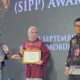 Kepala Bappeda Litbang Bone Bolango, Roswaty Agus saat menerima penghargaan Strategi Inovasi Perencanaan Pembangunan (SIPP) Award 2025 kategori Persona di Hotel Borobudur, Jakarta, Kamis (25/9/2025)/Ulanda.id
