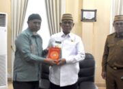 Perkuat Literasi Keagamaan dan Pendidikan, 7 Ribu Al-Qur’an Wakaf Diserahkan ke Pemkab Bone Bolango